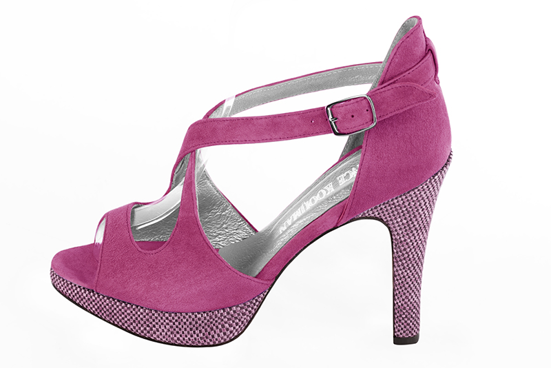 Shocking pink women's closed back sandals, with crossed straps. Round toe. Very high slim heel with a platform at the front. Profile view - Florence KOOIJMAN